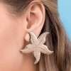 Aretes de estrellas de mar grande enchapadas en oro de 18k - Imagen 2