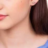Aretes de 3 Estrellitas Enchapados En Oro 18K - Imagen 3