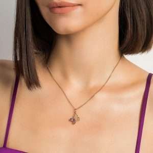 Alternative view of Dijes mariposa entrelazada con cristal morado enchapadas en oro 18k